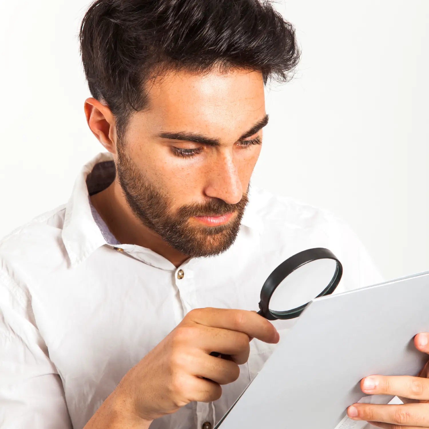 foreground-businessman-with-loupe